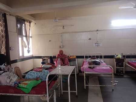 Contract employees raised slogans outside the office of Medical Superintendent and Director