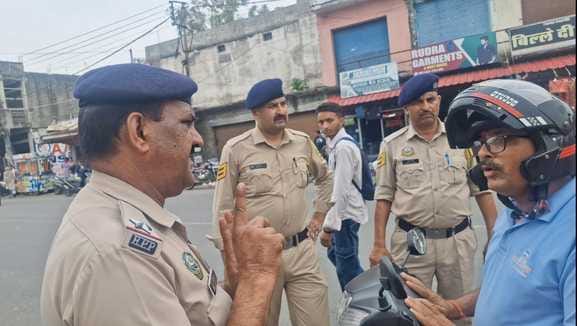 Double helmet awareness campaign run in Daulatpur Chowk