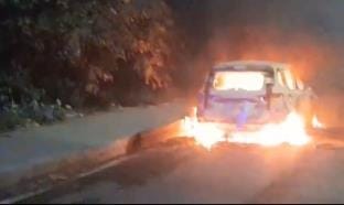 A couple and two children were injured in a truck collision, the car parked at the accident site was burnt to ashes