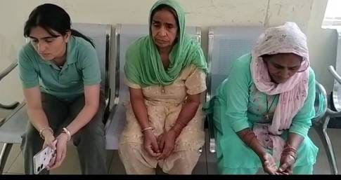 Two women snatched gold earrings from her ears