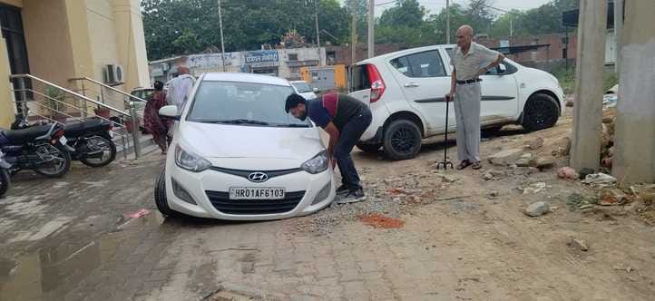 Open sewerage manholes in the district hospital are increasing the pain of patients