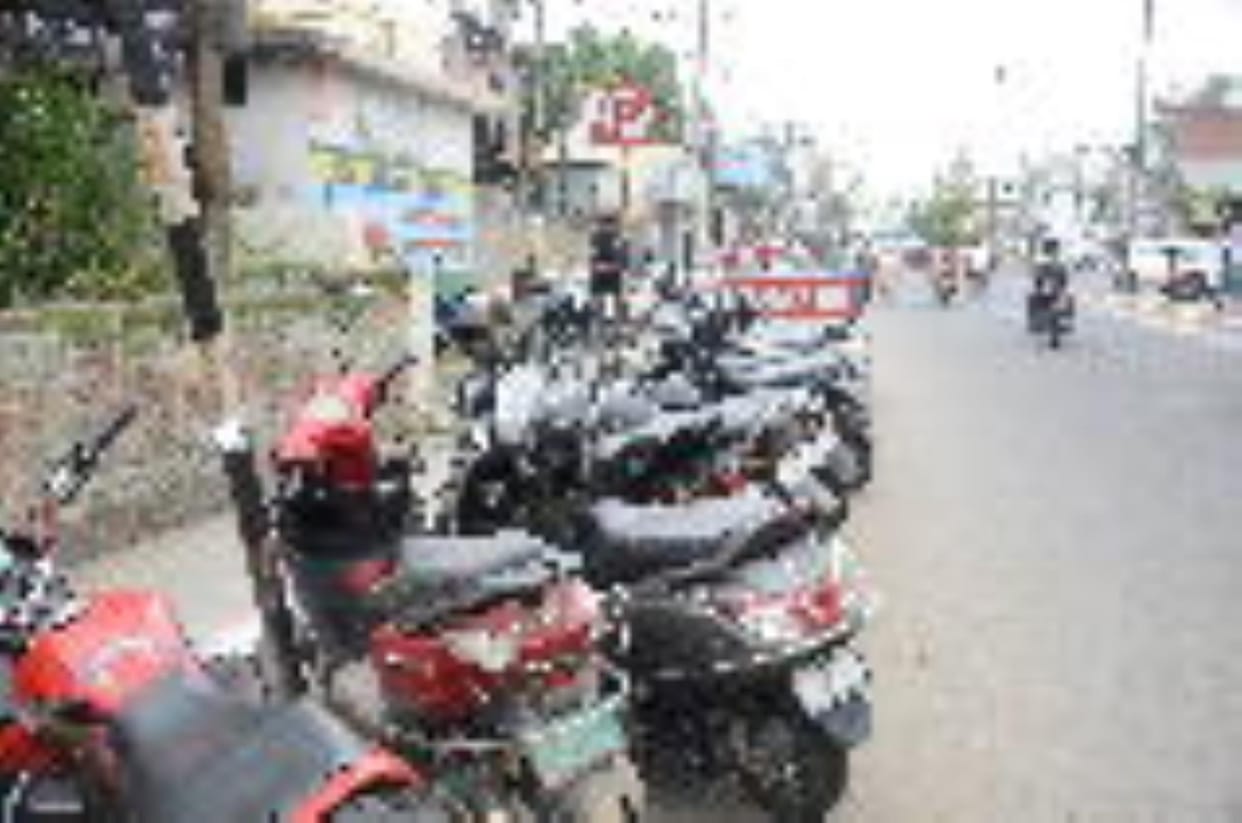 Even after the construction of new parking, vehicles are being parked outside the district secretariat