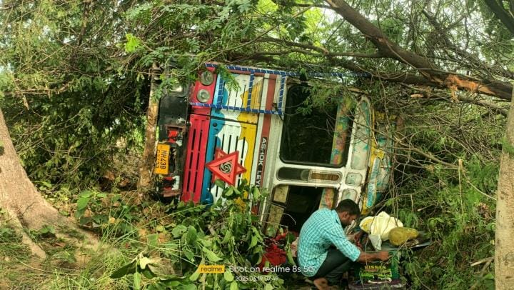 High speed truck overturned, driver safe