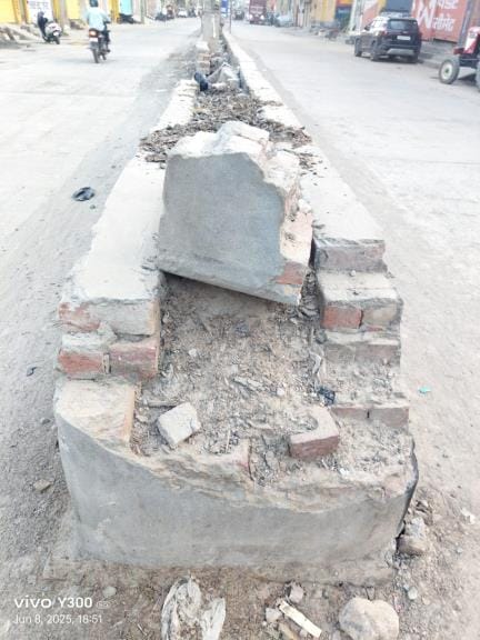 The work of installing dividers and street light poles on Gas Agency Road has been pending for two years