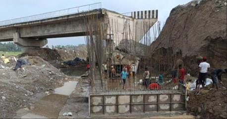 The dilapidated bridge of Sukro river increased the travel distance