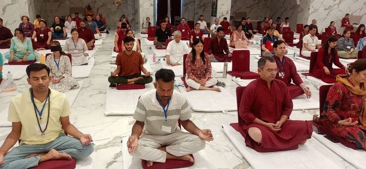 Yoga and group meditation were conducted for the seekers in Rajneesh Dhyan Mandir