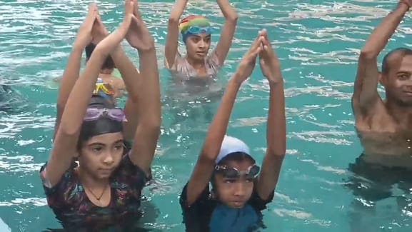 Ajmer News: Unique Initiative in Ajmer as Children Perform Yoga in Swimming Pool on International Yoga Day