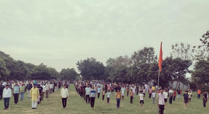 Volunteers performed yoga asanas in the Sangh's Van Vihar program
