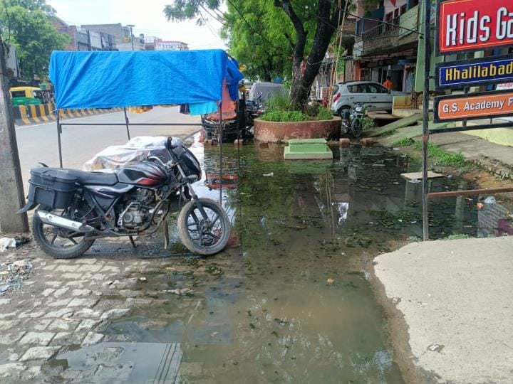 Water accumulated in front of shops and houses on Mendhawal Road