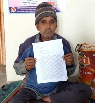 An old man sat on a hunger strike to get a job for his son