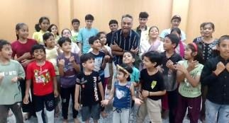 Children are learning the basics of acting in Walter Peter's school