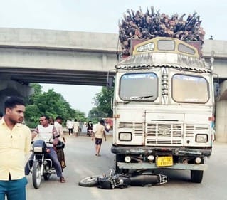 A young man was injured after being hit by a truck near the overbridge