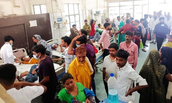 The ward is full of patients suffering from vomiting, diarrhea and fever
