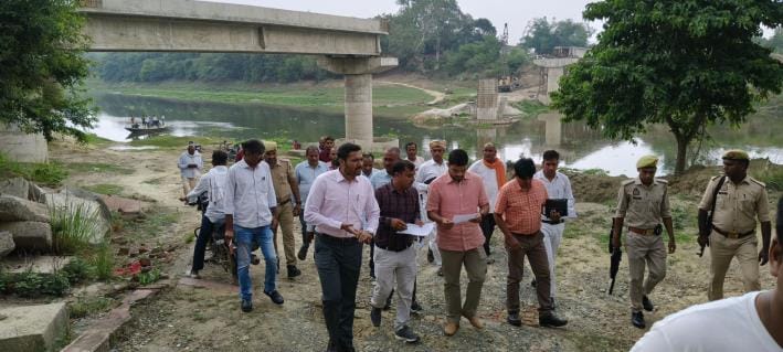 English   Bridge on the brink of completion, land acquisition not for access road