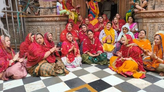 Women protested against the corridor by singing bhajans and kirtans