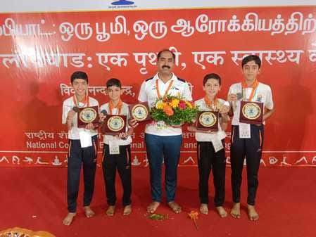 Two players of Chakmoh School won bronze medals in Yoga Olympiad