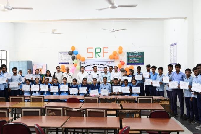 Certificates are distributed on completion of computer courses