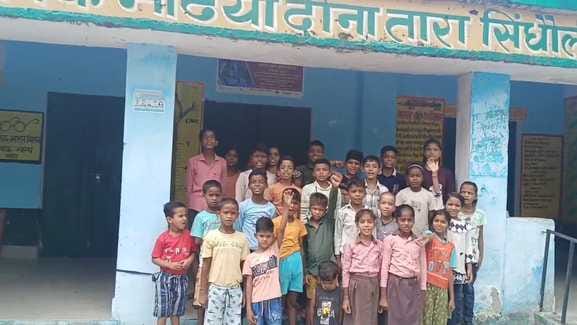 Children along with teachers protested against the merger of schools