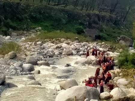 Stones are being taken out from the ravine where the flood occurred
