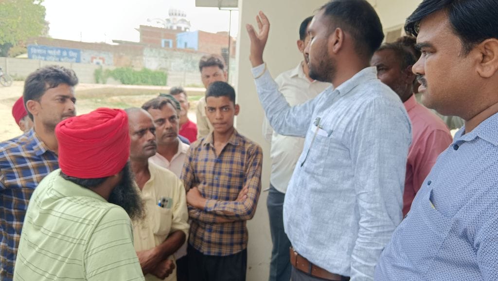 Villagers troubled by power crisis surrounded the engineers