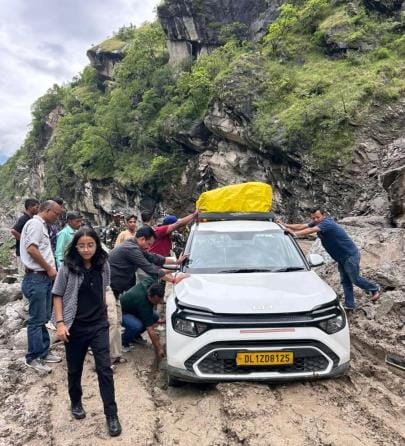 Vehicles of Adi Kailash pilgrims stuck on the road