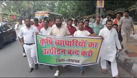 Fertilizer shopkeepers troubled by raids and harassment took out a march