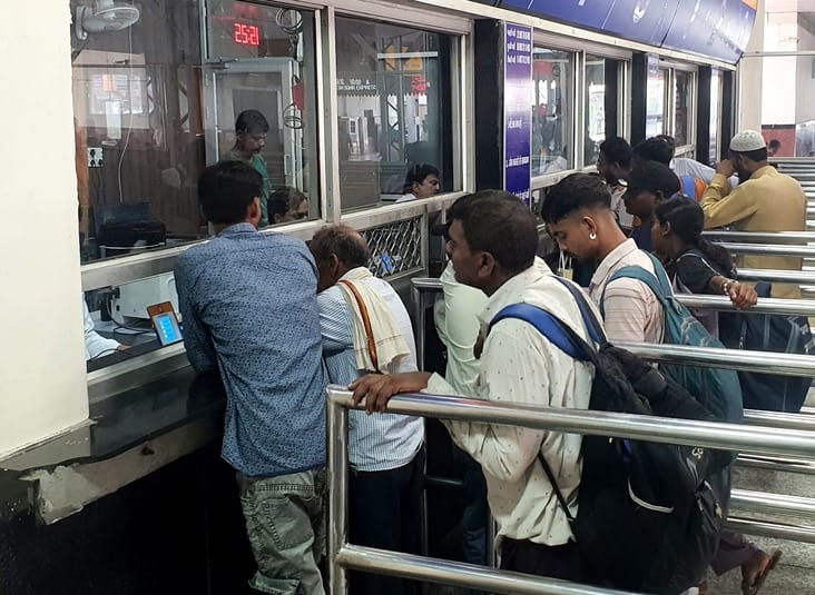 ATVMs have been installed, but passengers are still standing in queues