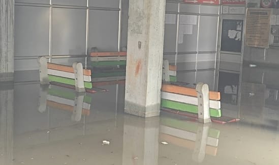 Negligence exposed during rain, water filled in municipal basement