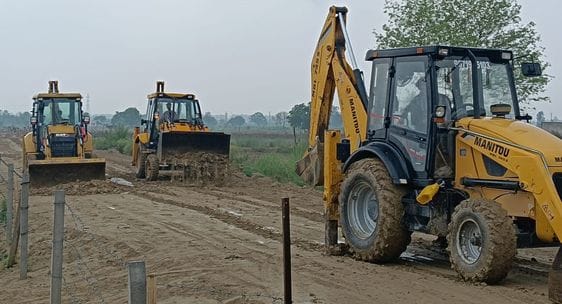 Bulldozer runs on illegal colony being established near Pahladpur
