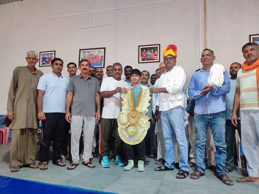 Neha returned with a gold medal and was honored