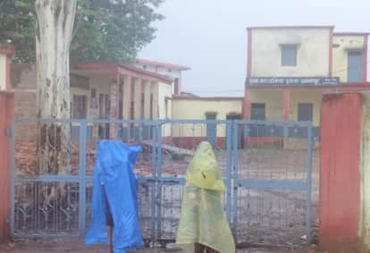 The kids were getting wet outside, the school gate was locked