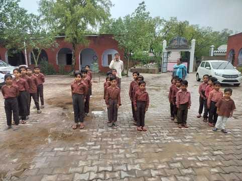 Schools opened after summer vacation, number of children was less due to rain