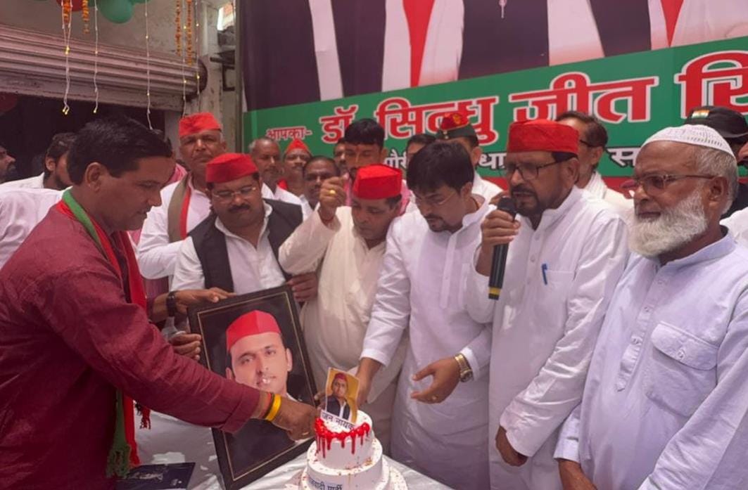 SP workers cut cake and distributed bicycles