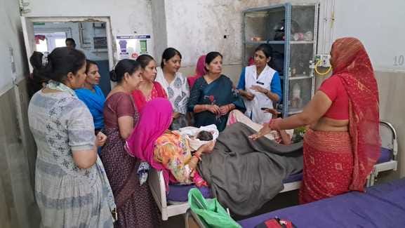 The women's ward was filled with water, two women were being treated on one bed