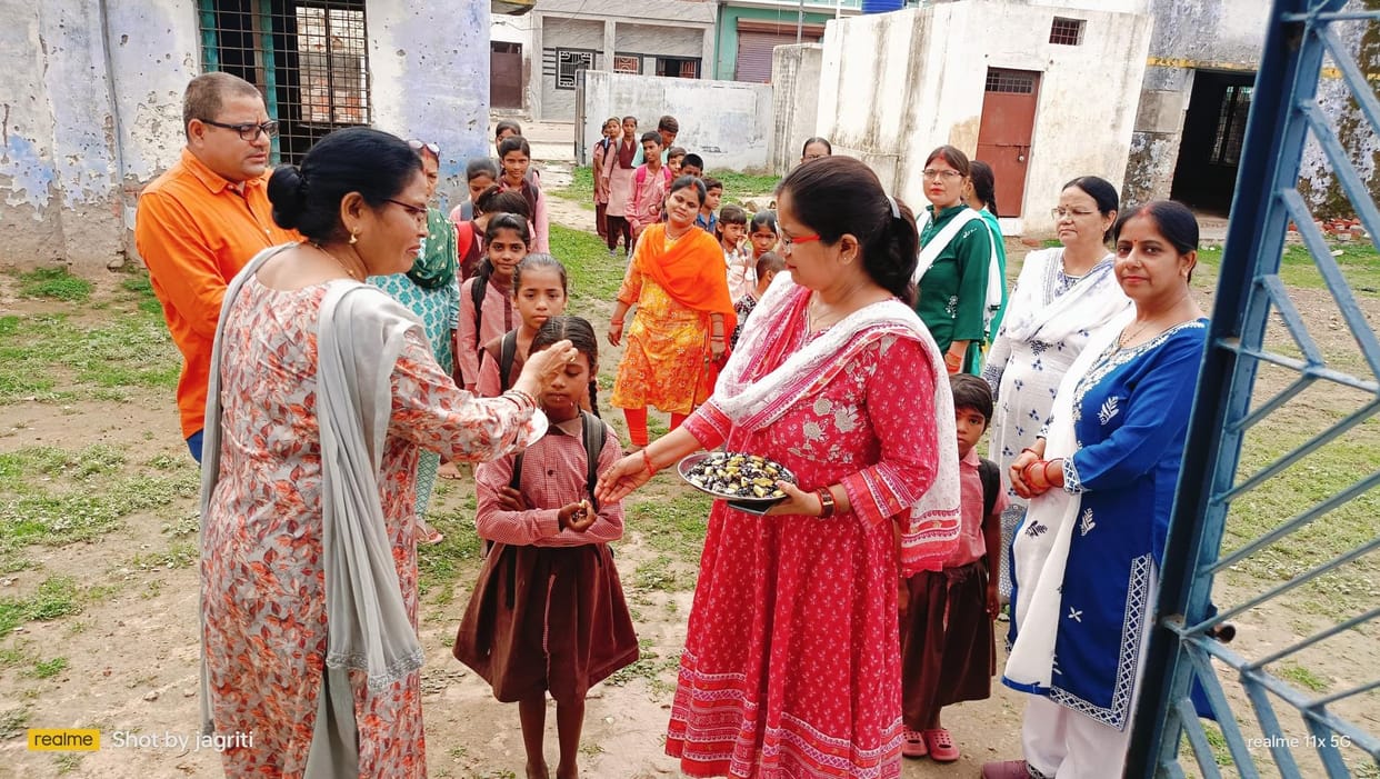 Aarti of children was performed by applying roli