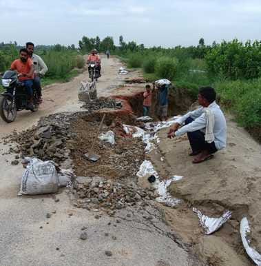 Work to fill potholes on road begins