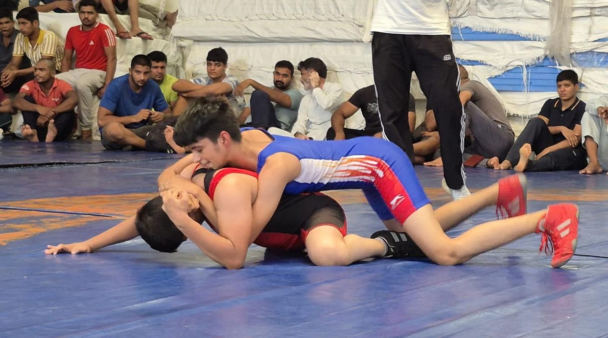 The players displayed their strength in the district-level wrestling.