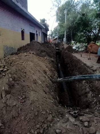 Digging roads and tracks to lay drinking water pipeline