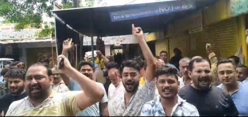 Accusation of indecency with the trader, sloganeering against GST officer
