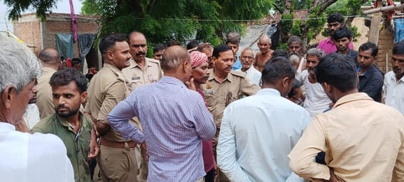 The body of a young man was found stuck to an electric wire in the field
