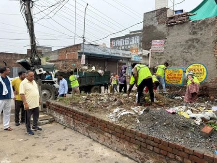 Garbage picked up from plots, grass cleaned