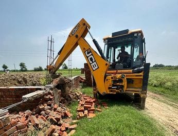 Bulldozer runs on colony cut in five acres