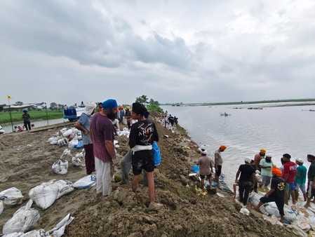 The leakage has stopped, the volunteers are busy strengthening the banks