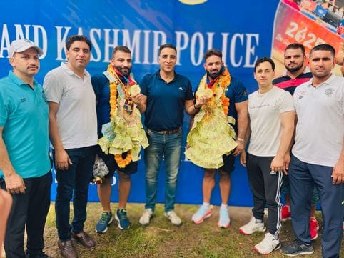 Wrestlers who returned from a golden journey to America from a mud arena were given a grand welcome