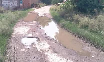 Potholes and water on the roads, making walking difficult