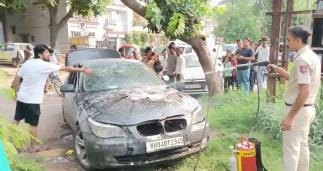 Fire broke out after explosion in a parked BMW