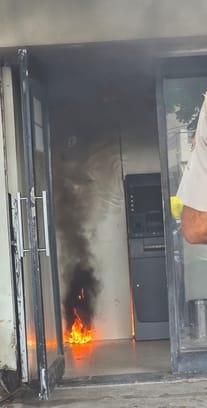 Fire breaks out in Axis Bank ATM booth, cash safe