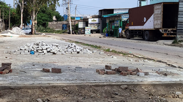 Company laid tiles on the road without permission, served notice