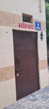 Lock hanging on the toilet built on Bamadoli Road, women troubled