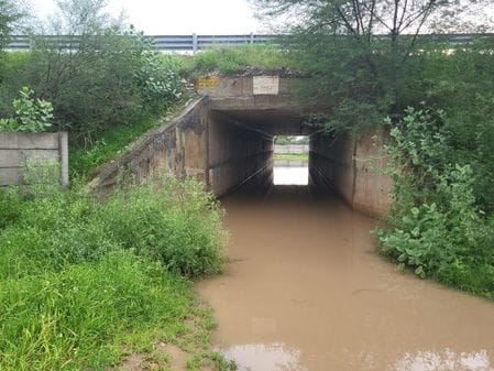 Rain water filled in culvert and underpass